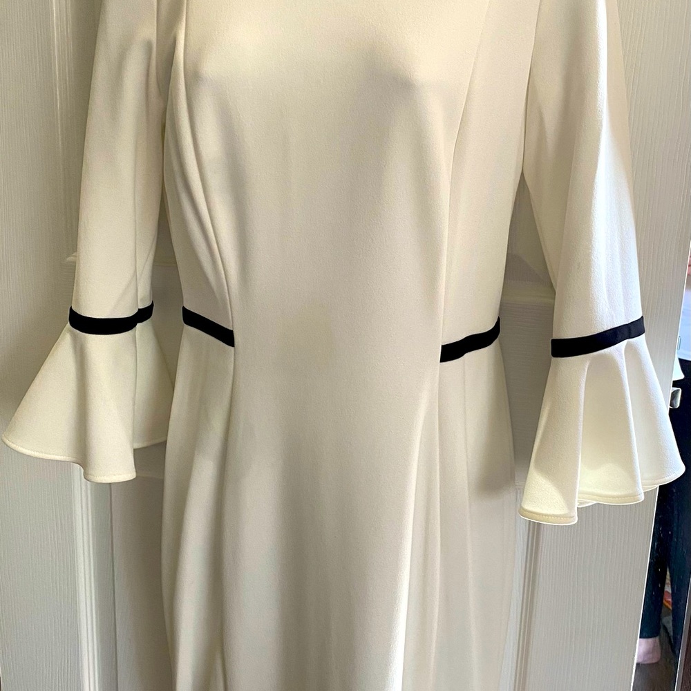 Beautiful white and black Calvin Klein below the knee dress.